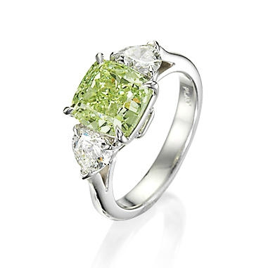 A fancy coloured diamond and diamond ring