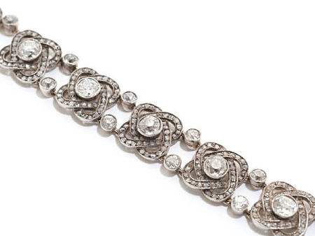 A_diamond_set_gold_and_silver_bracelet