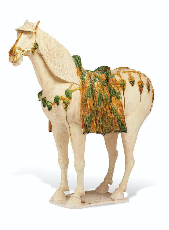 A large sancai-glazed pottery figure of a caparisoned horse, Tang dynasty (AD 618-907)