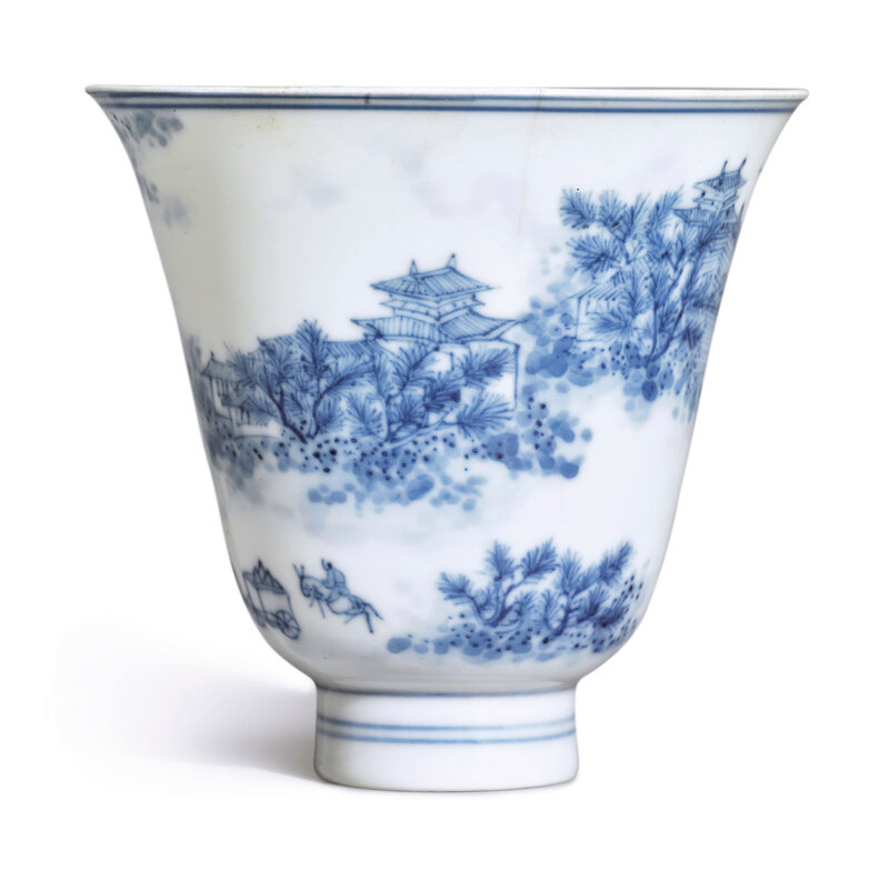 A rare finely painted blue and white 'Landscape' cup, Kangxi mark and period (1662-1722)