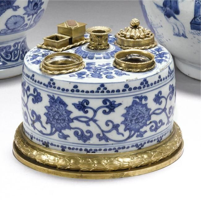 A gilt-metal mounted blue and white inkwell, the porcelain Ming dynasty, 16th century, the mounts later