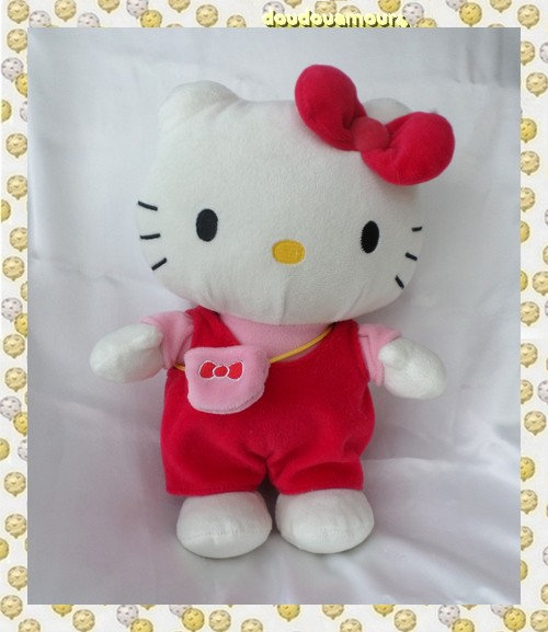 Doudou Peluche Hello Kitty Salopette Noeud Rouge Sac Rose Sanrio