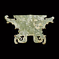 A celadon jade ancestor mask, <b>Neolithic</b> <b>period</b>, Shijiahe culture (2500–2000 BC)