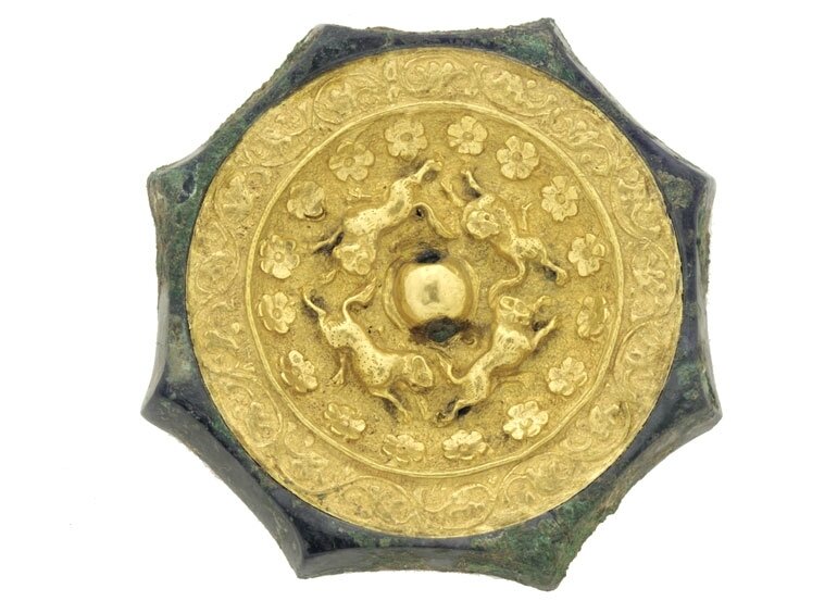 Octagonal mirror with animals, flowerets, and floral scrolls, China, early or mid-Tang dynasty, late 7th–first half of 8th century