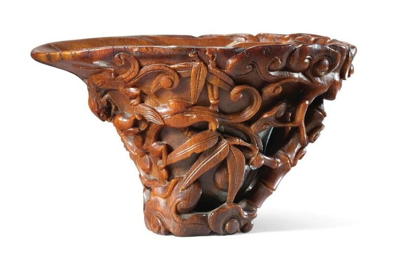 A finely carved rhinoceros horn 'Chilong and Lingzhi' libation cup, 17th century