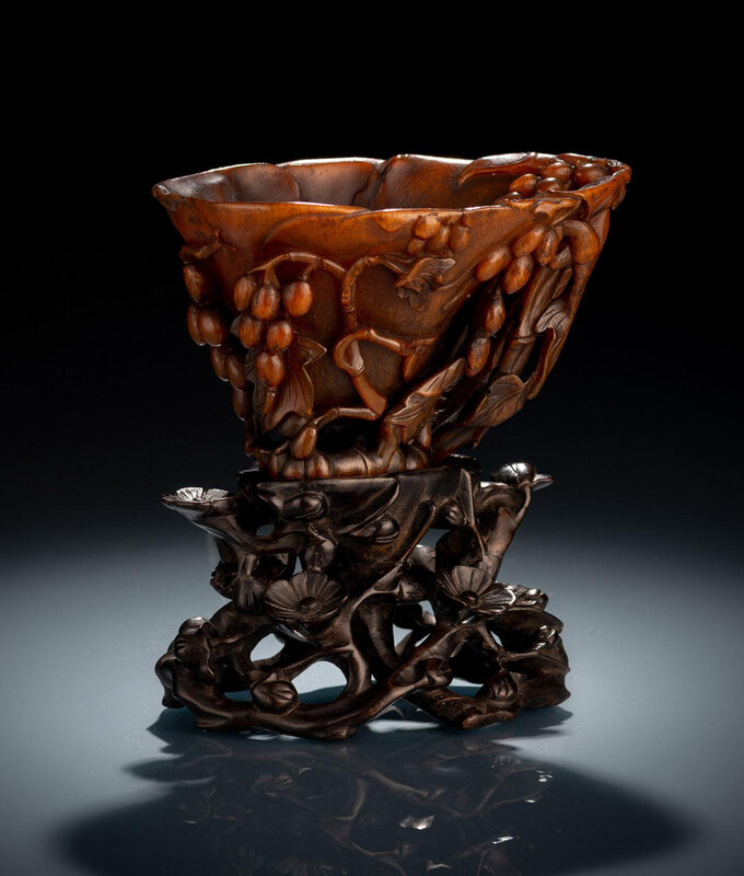 A well carved rhinoceros horn wine cup with grapewine carving, 18th century
