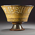 A rare <b>Mamluk</b> sgraffito pottery bowl with lion of Baybars, Egypt, circa 1260-77 AD