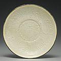 A molded 'Ding' dish, Northern Song dynasty (960-1127)
