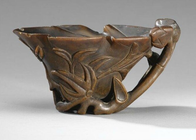 A Carved Rhinoceros Horn Libation Cup, Qing Dynasty, 17th-18th Century