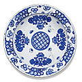 A rare <b>Iznik</b> blue and white pottery dish, Turkey, circa 1560-1570