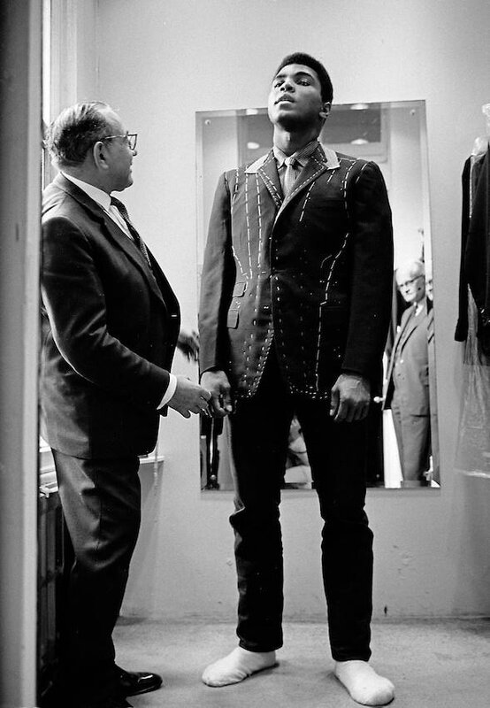 Muhammad Ali is measured for a suit in Savile Row, 1966 • Thomas Hoepker