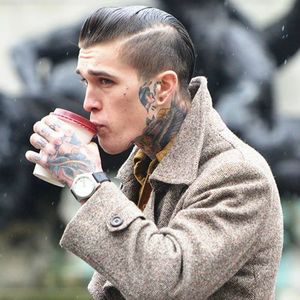 model tattoos neck face side coffee