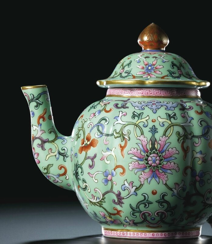 A fine and rare lime-ground Famille-Rose teapot and cover