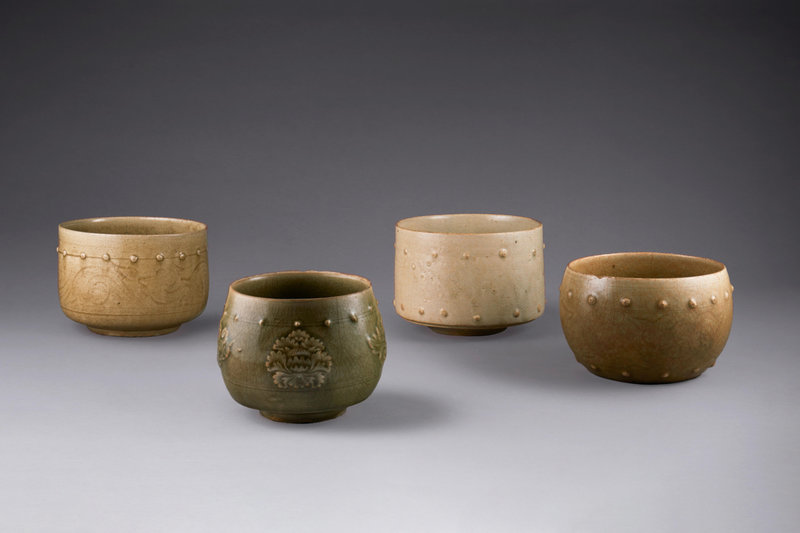 A group of four stoneware moulded bowls, Vietnam, 13th-15th century