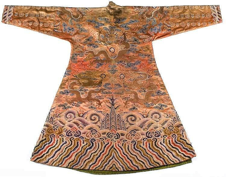A coral ground silk Tibetan chuba, tailored from 18th century Chinese kesi2