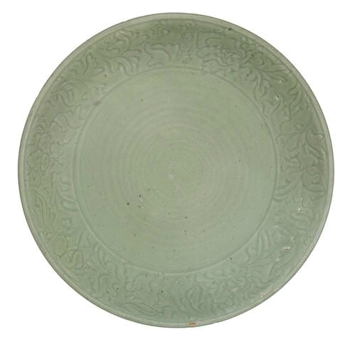 A large Longquan celadon-glazed carved 'peony' dish, 14th-15th century