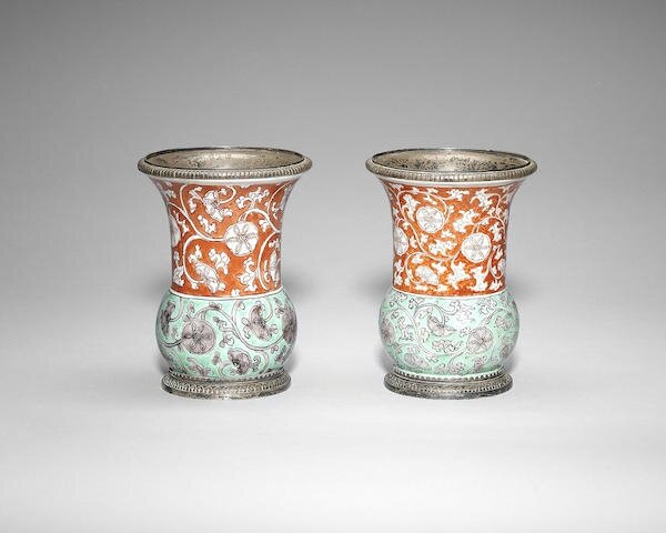 A pair of metal-mounted iron-red, green and aubergine enamelled vases, zhadou, 17th century, the mounts later