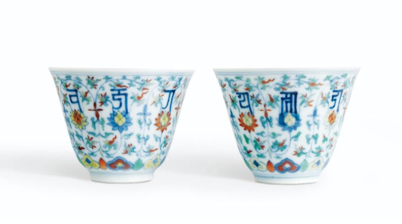 A fine pair of doucai cups with lança characters and lotus, Marks and period of Yongzheng