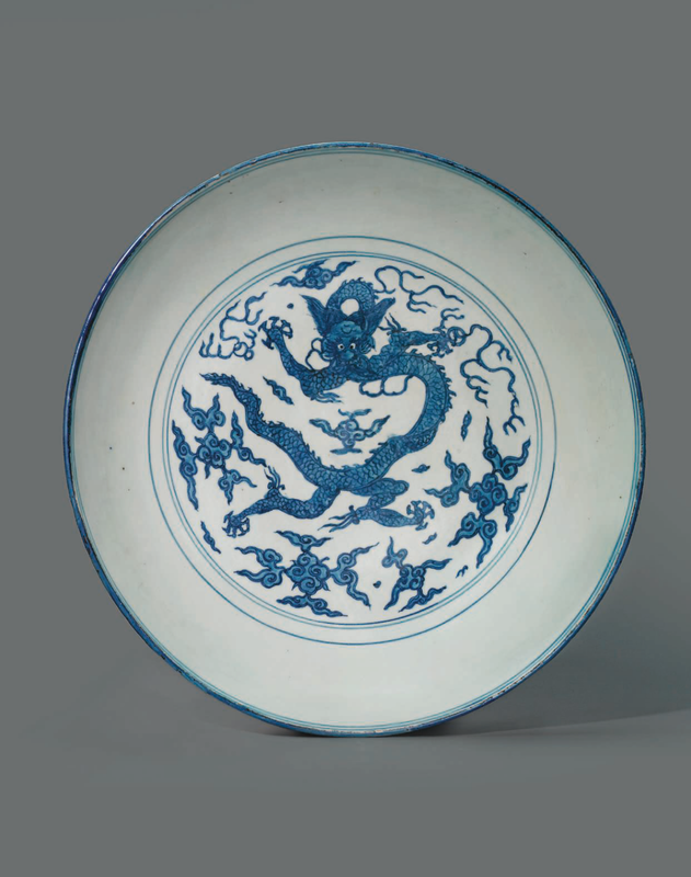 A large blue and white 'Dragon' dish, Jiajing six-character mark in underglaze blue and of the period (1522-1566)