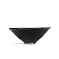 A Xinan <b>black</b>-<b>glazed</b> conical bowl, Song dynasty (960-1279)