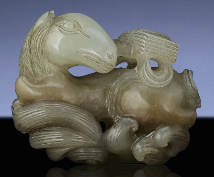 A small celadon jade carving of a mythical beast, longma, Ming dynasty, 16th-17th century