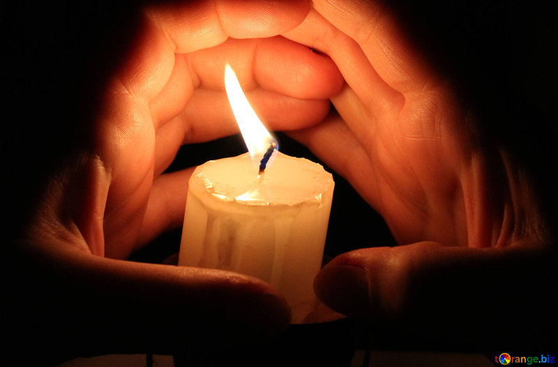 candle-burning-hand-hands-around-candles-18098