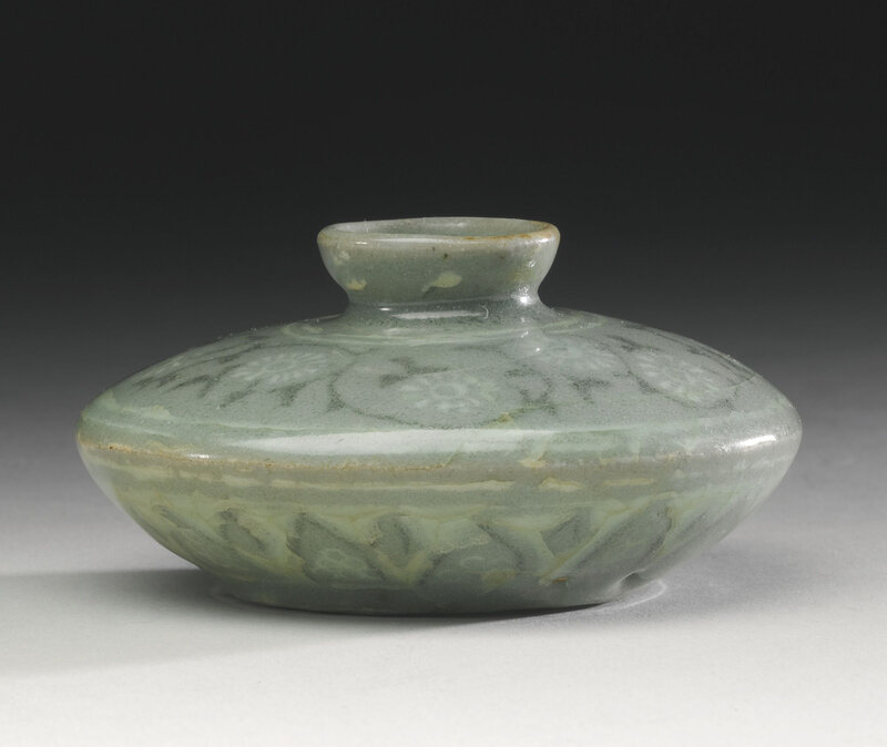 A Korean slip-inlaid celadon stoneware oil bottle, Goryeo dynasty, 13th century