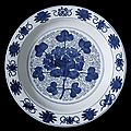 Dish (Pan) with Grape Spray, <b>Eight</b> <b>Auspicious</b> <b>Symbols</b>, and Rosettes, late Ming dynasty, about 1550-1644