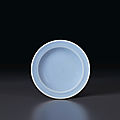 A small pale blue-glazed dish, <b>Yongzheng</b> <b>four</b>-<b>character</b> <b>seal</b> <b>mark</b> in underglaze blue <b>and</b> <b>of</b> <b>the</b> <b>period</b> (<b>1723</b>-<b>1735</b>)
