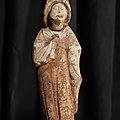 A painted pottery figure of a court lady, Tang Dynasty (618-906 AD)