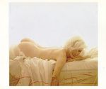 1962_07_10_by_bert_stern_bed_color_0010_07signed