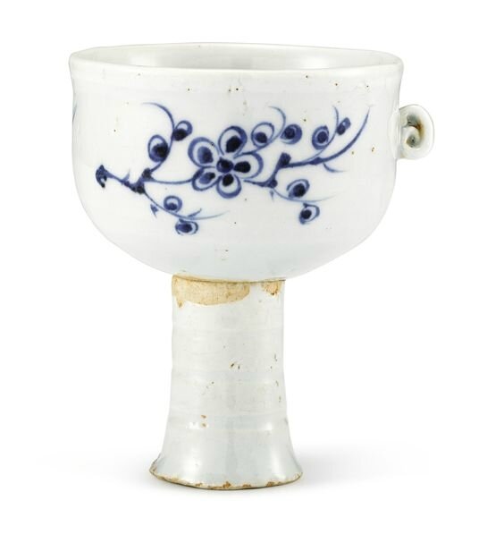 A blue and white 'Prunus' stem cup, Yuan dynasty (1279-1366)