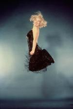 1959-10-NY-Jump_sitting-black_dress-by_halsman-016-1a