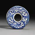 A blue and white <b>Iznik</b> pottery disc, Turkey, circa 1520