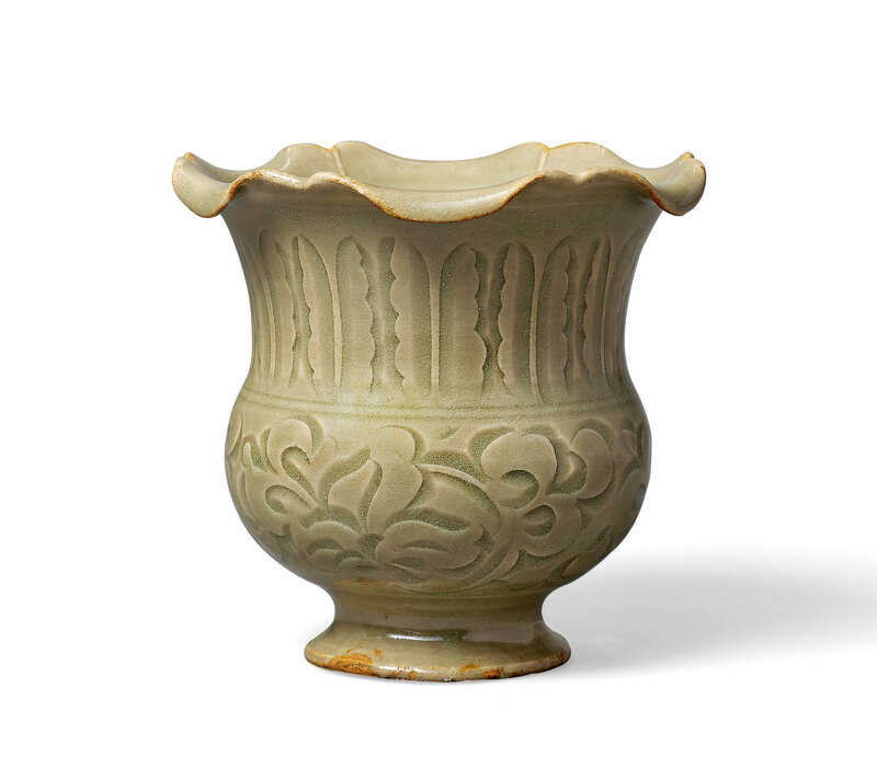 A carved Yaozhou celadon 'peony' foliate-rim vase, zun, Northern Song Dynasty to Jin Dynasty (AD 960-1234)