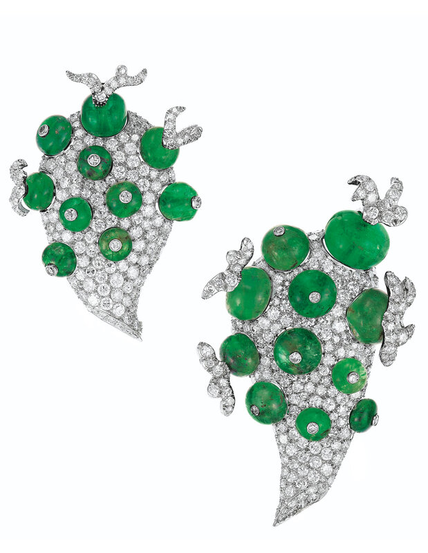 2019_NYR_17450_0030_000(an_unusual_pair_of_emerald_and_diamond_clip-brooches_paul_flato)