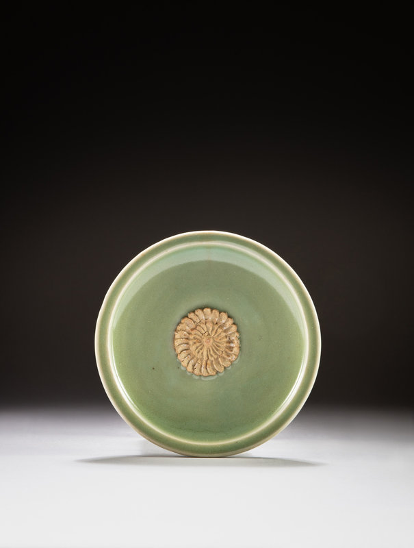 A 'Longquan' celadon-glazed and biscuit-decorated dish, Yuan dynasty