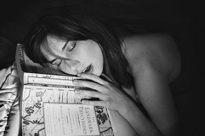 girl_sleeping_book