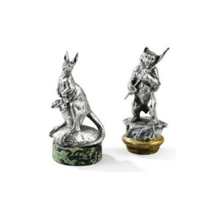 two_curious_silver_plated_car_mascots