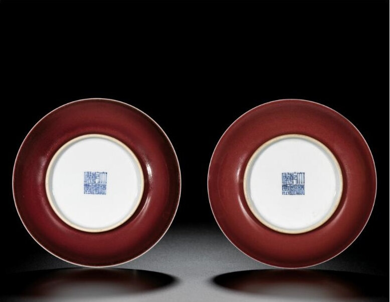 A pair of copper-red saucer dishes, seal marks and period of Qianlong (1736-1795)