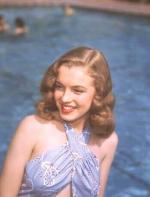 1946-04-04-pool_sitting-swimsuit_blue-010-1-by_richard_c_miller-1