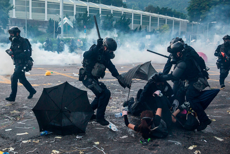 Hong Kong demonstrators beaten by China police