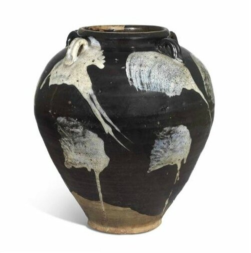 A large phosphatic-glazed stoneware jar, Tang dynasty (618-907 ad)