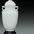 A white jade facetted <b>baluster</b> <b>vase</b> <b>and</b> <b>cover</b>, Late Qing dynasty-Early Republic period