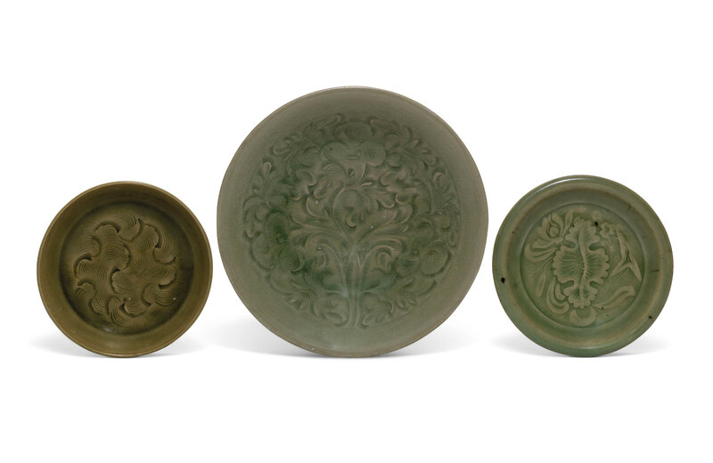 A carved Yaozhou celadon bowl and a Yaozhou dish and a carved celadon-glazed dish, Song dynasty (960-1279)