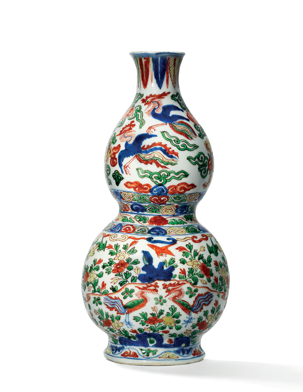 A rare wucai ‘phoenix’ double-gourd form wall vase, Wanli six-character mark in underglaze blue within a double rectangle and of the period (1573-1619)