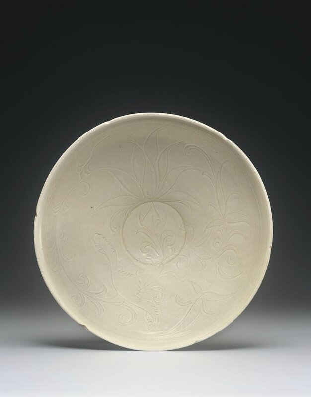 A carved 'Ding' 'Lotus' bowl, Northern Song dynasty1