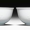 A very rare pair of moulded white-glazed bowls, <b>Yongzheng</b> <b>seal</b> <b>marks</b> <b>and</b> <b>period</b> (1723-1735)