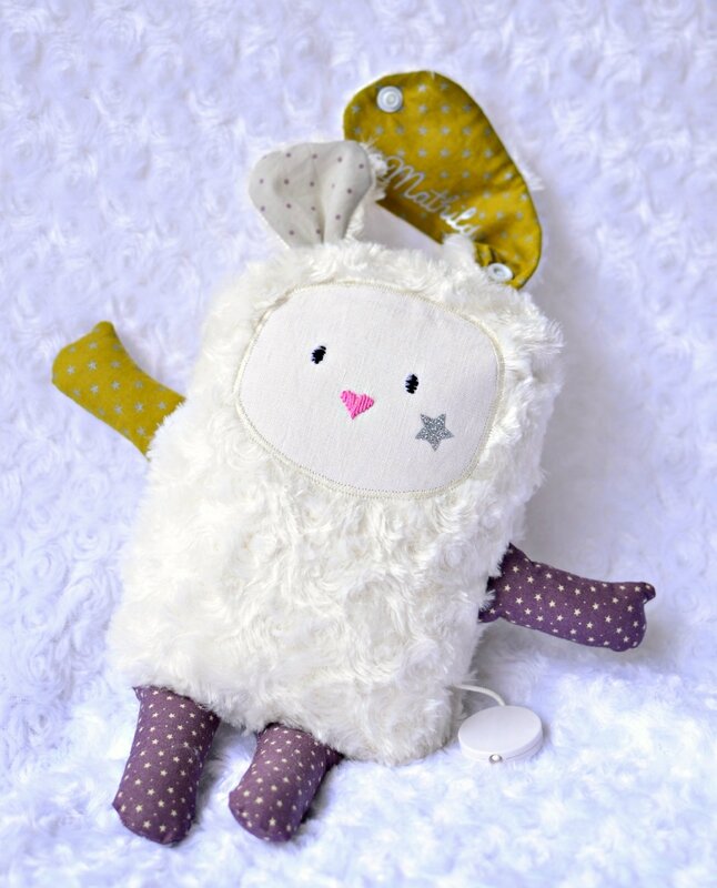 doudou musical peluche musical fourrure blanche et coton liberty