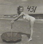 1949_tobey_beach_by_dedienes_umbrella_red_061_3